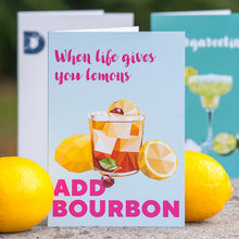 greeting card with bourbon sour cocktail reading "when life gives you lemons add bourbon"