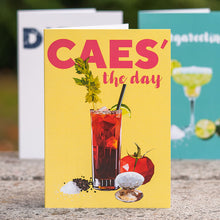 greeting card with Caesar cocktail reading "caes' the day" (a play on "seize the day") 
